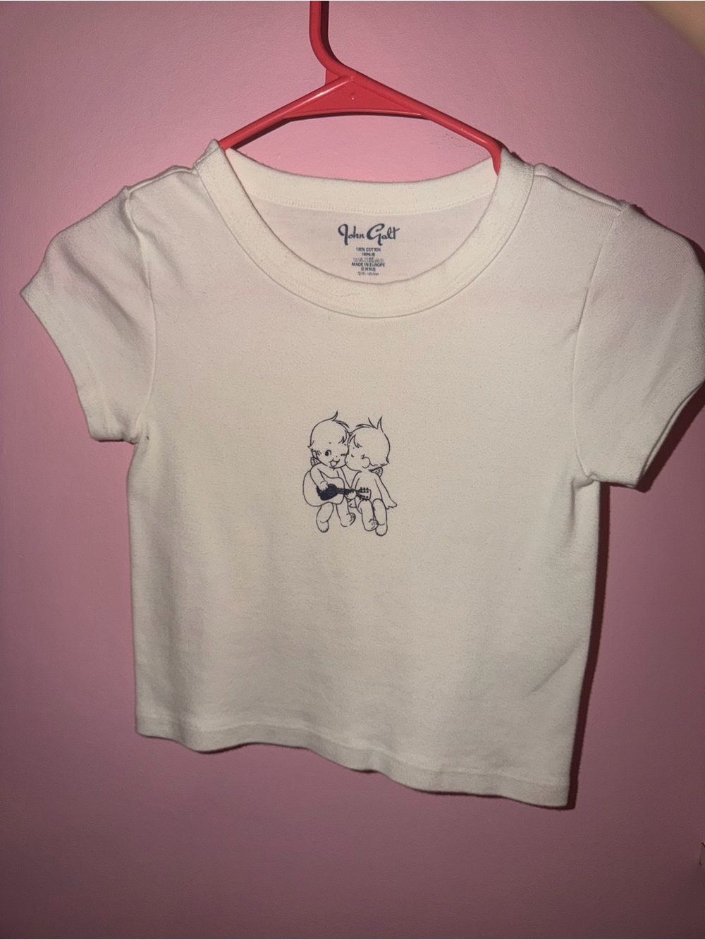 Brandy Melville White Crop Top with Small Black Line Art Graphic
